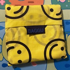 Lightly used yellow happy standard baggu